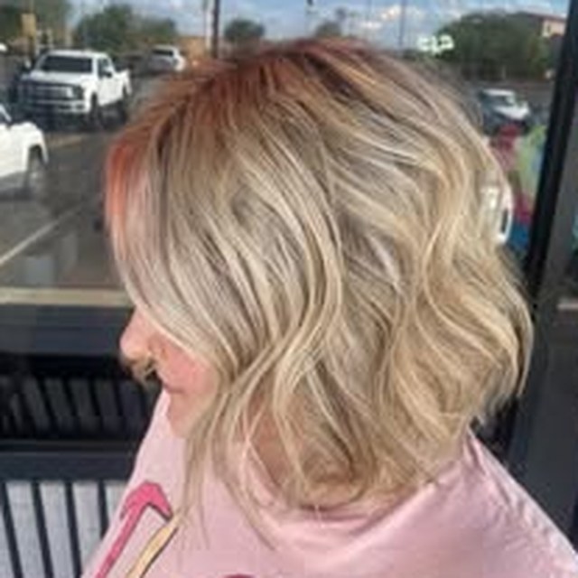 Hair work by Seantel Oliver — wavy blonde bob with balayage