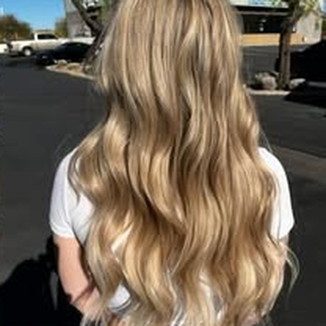Hair work by Seantel Oliver — long honey blonde waves