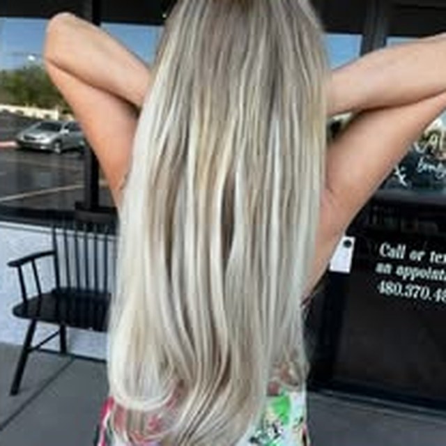 Hair work by Seantel Oliver — sleek platinum blonde