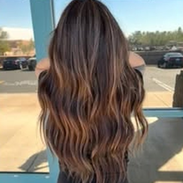 Hair work by Seantel Oliver — long brunette with warm ends